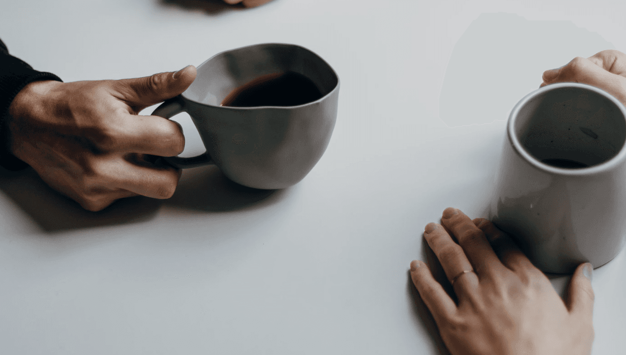 Drinking coffee in a table